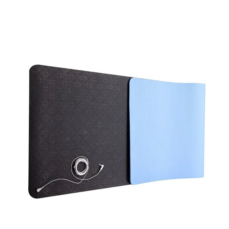 Blue conductive yoga mat with plant pattern and grounding wire, showing non-slip texture and 182cm length.