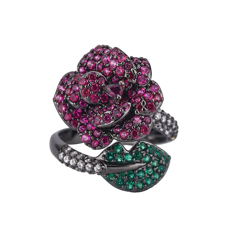 Geometric flower personality ring with gold-plated copper construction and red corundum centrepiece