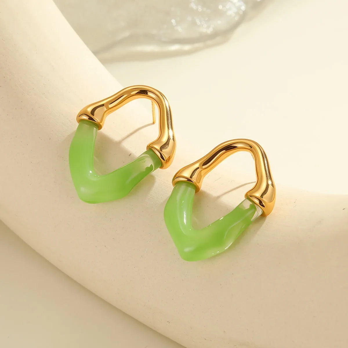 Women's stainless steel earrings with colour resin stitching in pink and blue, 18K electroplated finish