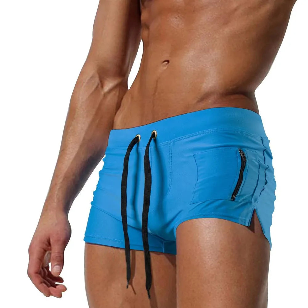 Men's black polyester swimming trunks with lace-up front and high-waist design
