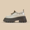 White British style women's platform Mary Jane shoes with chunky heel and front lace-up.