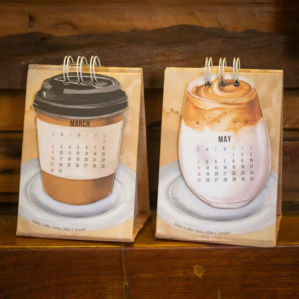 Mini desk calendar 2025 with four themed paper designs including coffee time model