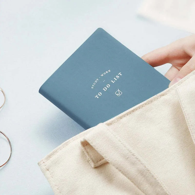 Simple Notepad with PU cover in morandi blue, showing open pages of eye protection writing paper