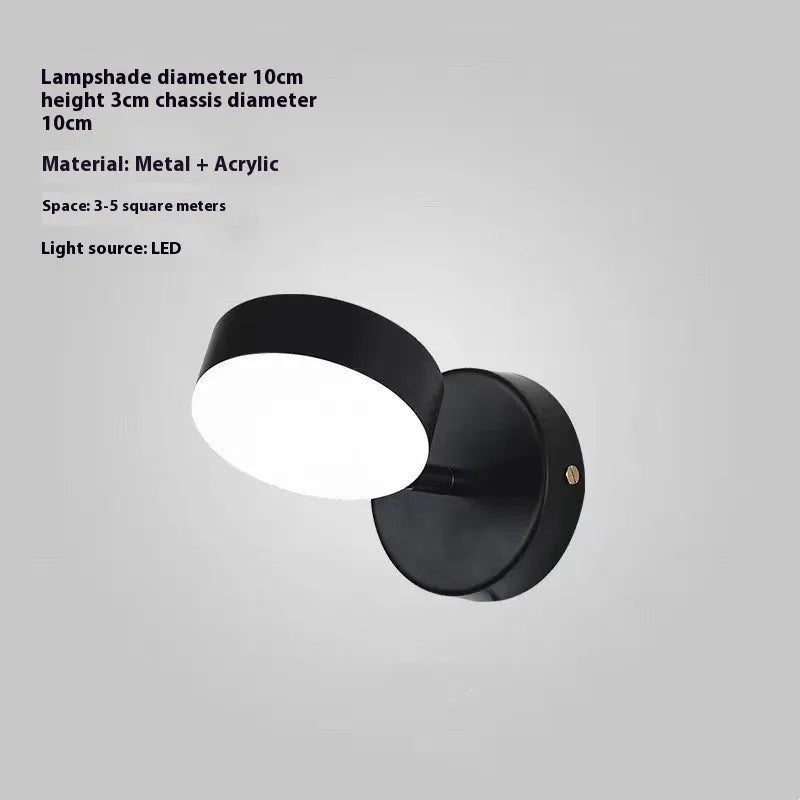 Rotatable bedside wall lamp with golden mirror front in gold finish mounted on wall