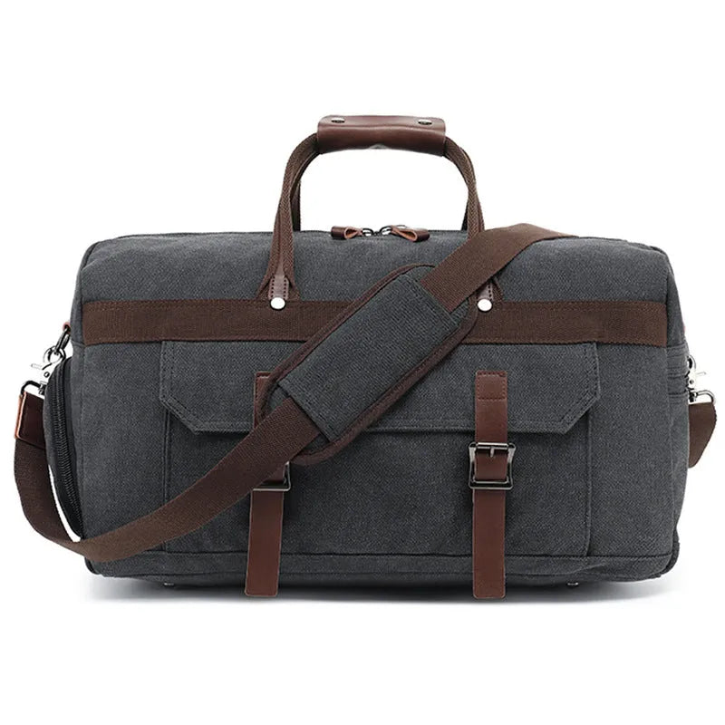 Men's large canvas crossbody travel bag in a retro style, shown in a solid colour.