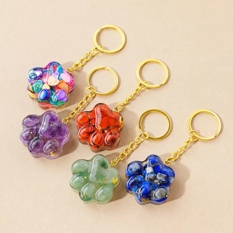 Handmade natural crystal cat's paw keychain pendant in choice of ten stones including pink crystal and turquoise.