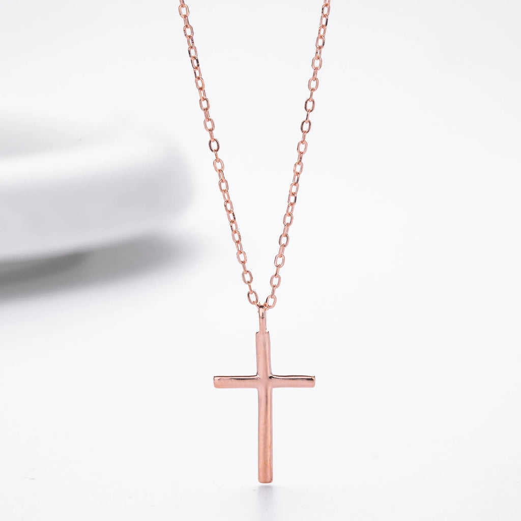 S925 sterling silver cross pendant necklace on an O-shaped chain in a gold electroplated finish.