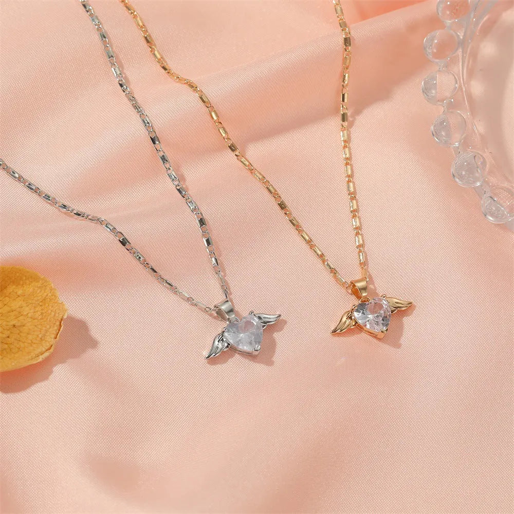 Heart wings necklace for women, copper pendant in gold finish, love themed jewellery