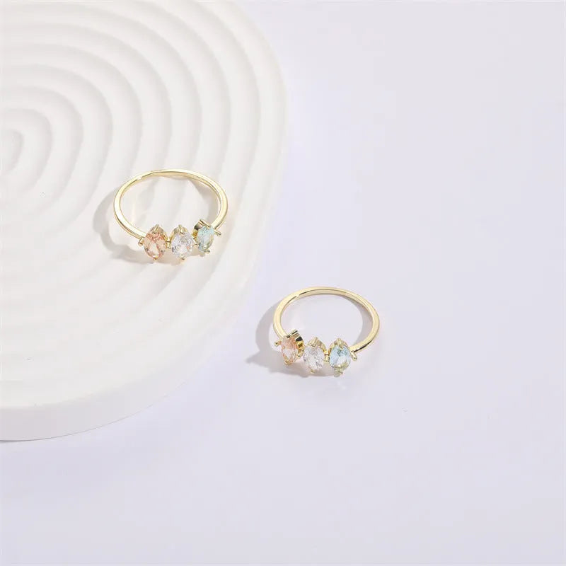 Geometric triangle birthstone ring with horse eye tricolor zircon stone in 14k gold plating