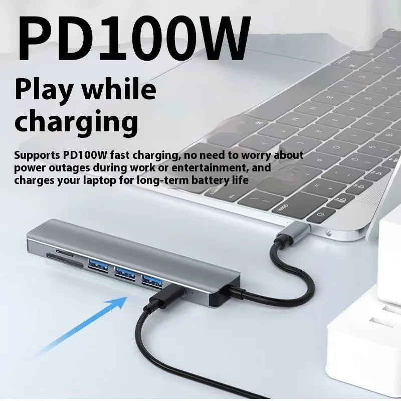 USB-C 7-in-1 expansion dock with HDMI port and multiple USB connections on a 15cm cable.
