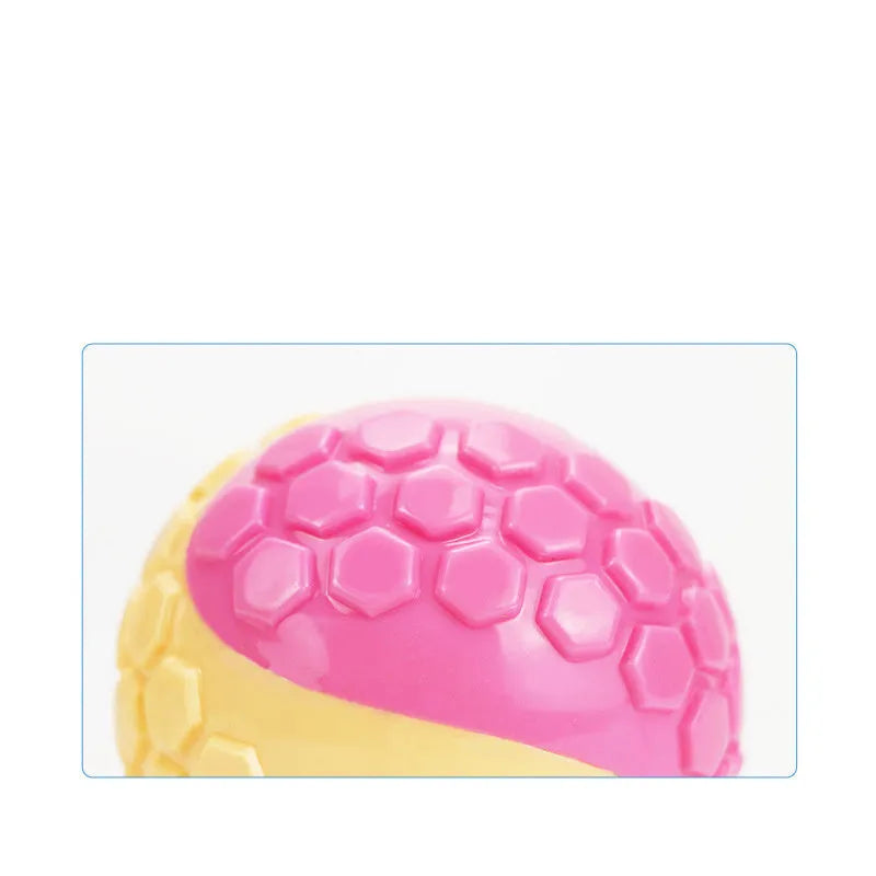 TPR plaid molar dog toy ball in blue, pink, green, and grey colours with textured surface