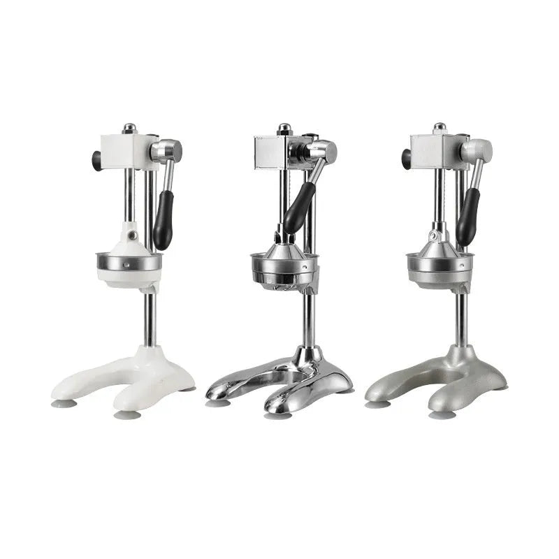 Stainless steel vertical manual juicer on a kitchen countertop in a choice of colours.