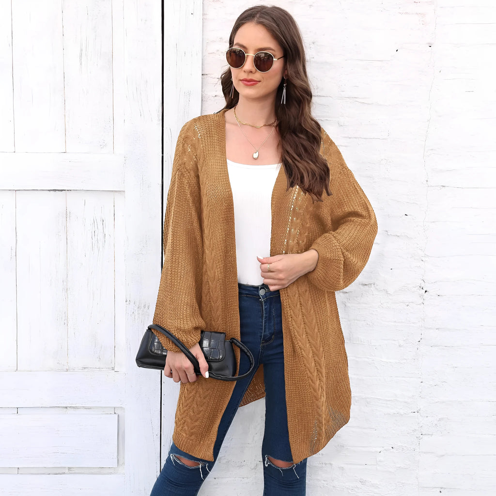 Brown loose-fitting acrylic sweater coat for women on a hanger.
