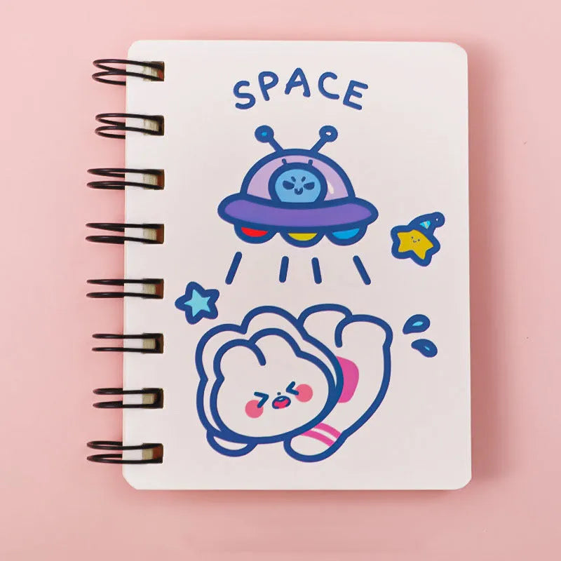 Compact astronaut series flip notebook with space-themed cover, shown closed.