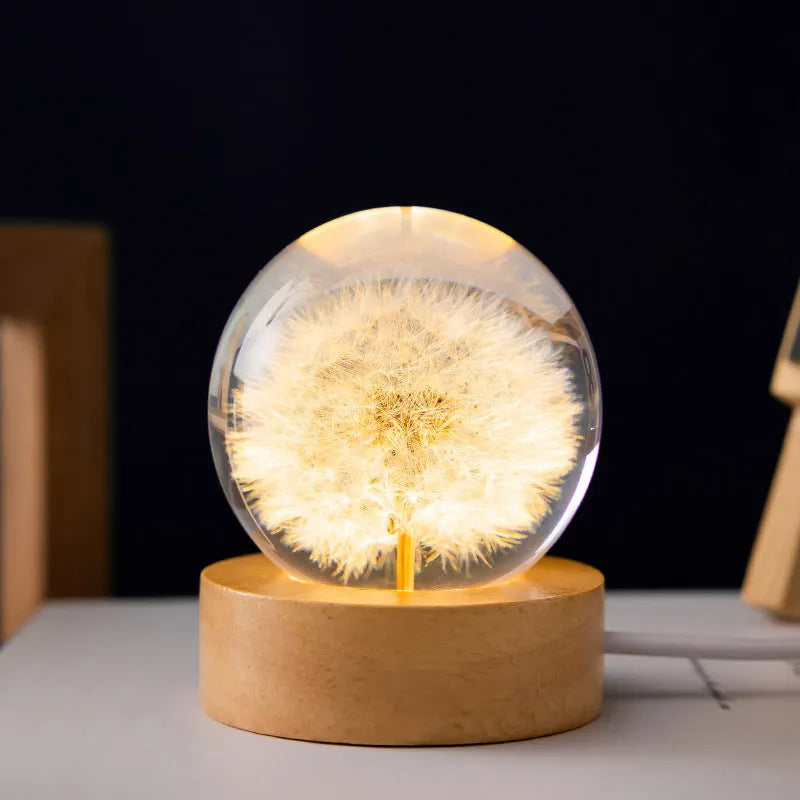 USB dandelion crystal ball night light on wooden base, showing preserved flowers inside 6cm resin sphere.