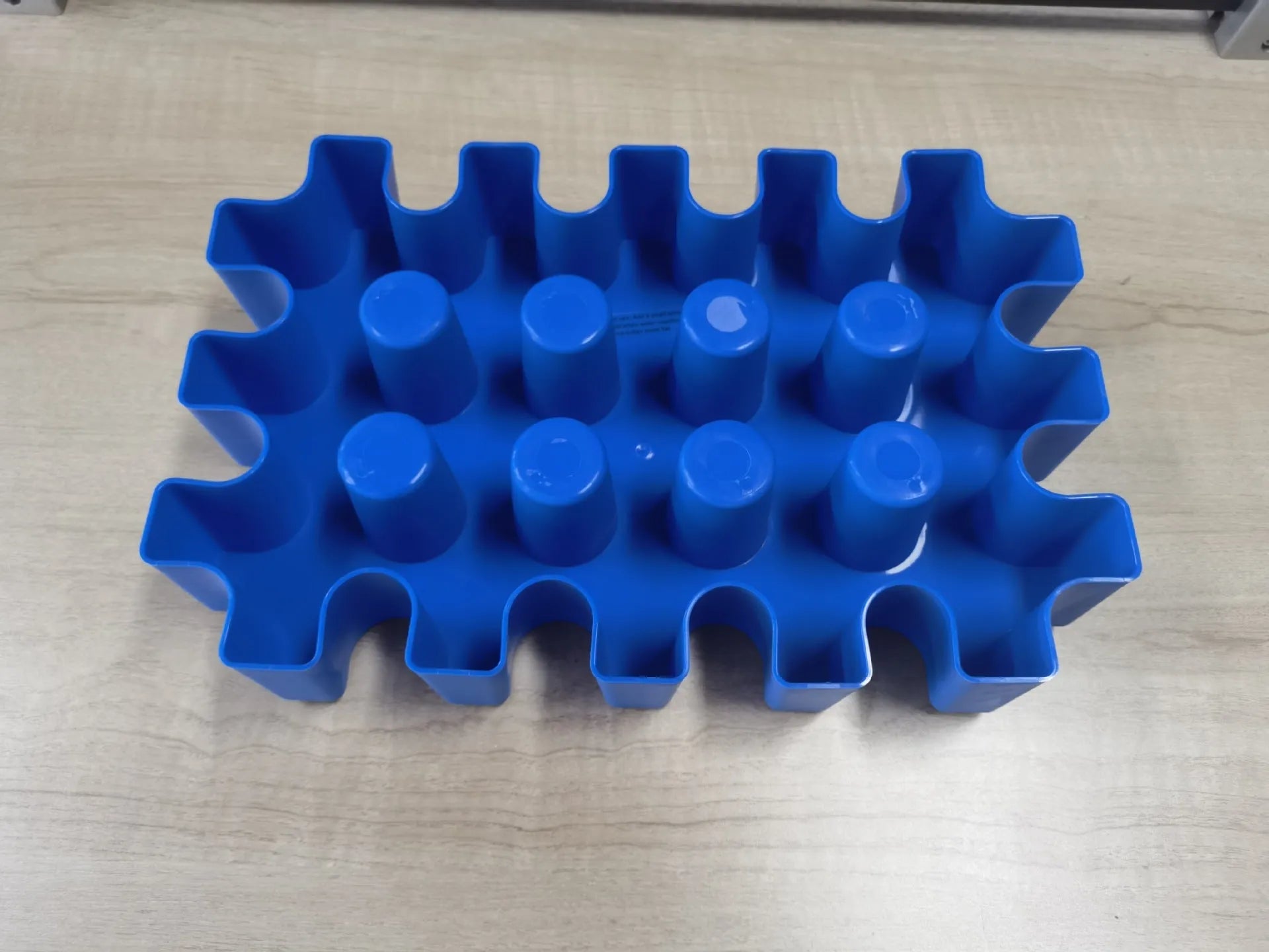 Blue polypropylene ice maker tray measuring 34cm long for outdoor camping and barbecues