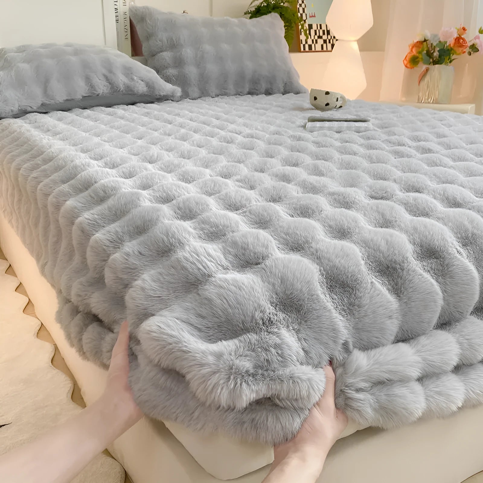 Class A milk fiber fitted sheet with rabbit plush in clear blue, showing elastic edges and smooth surface