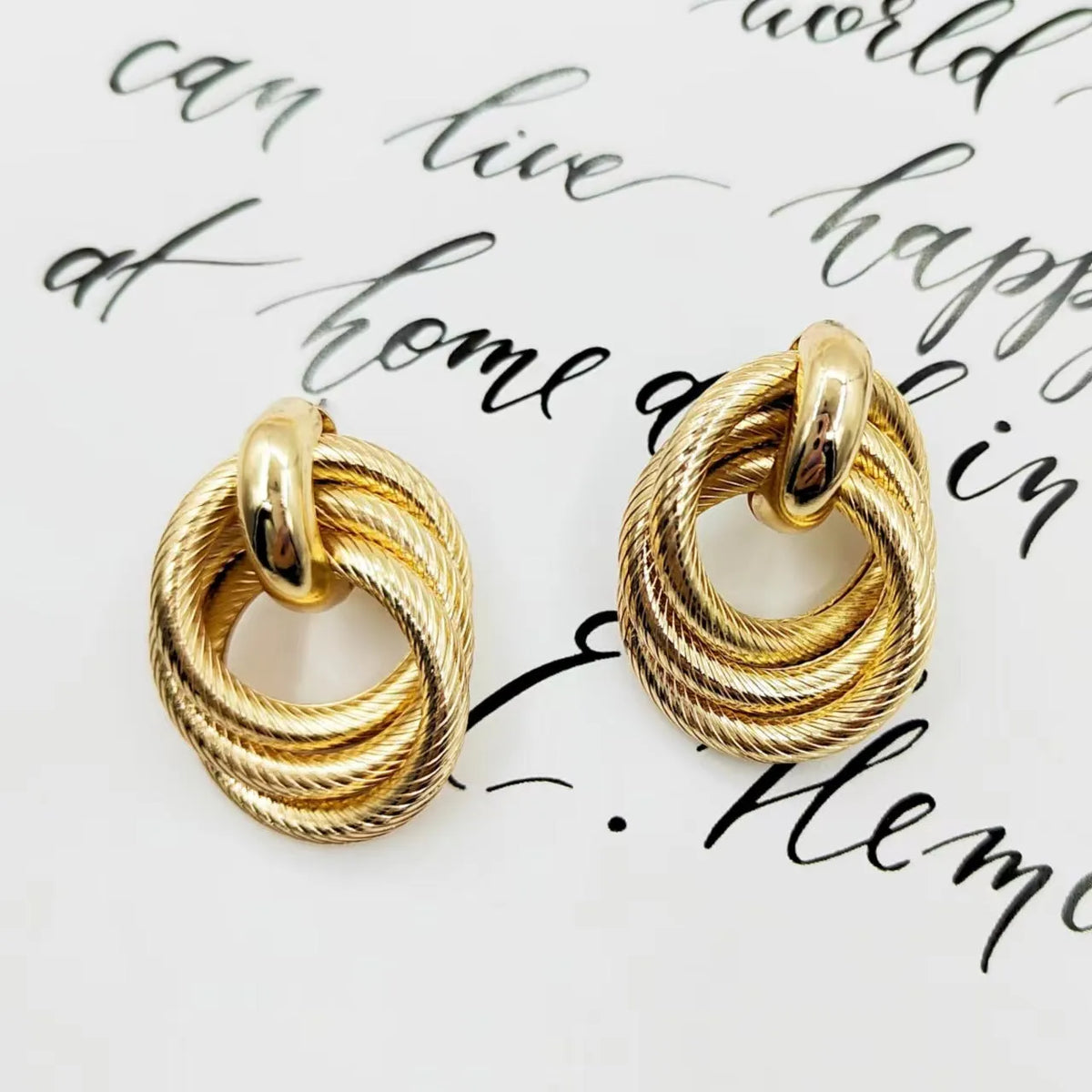 Gold electroplated geometric ring embossed twisted stud earrings for women, one pair