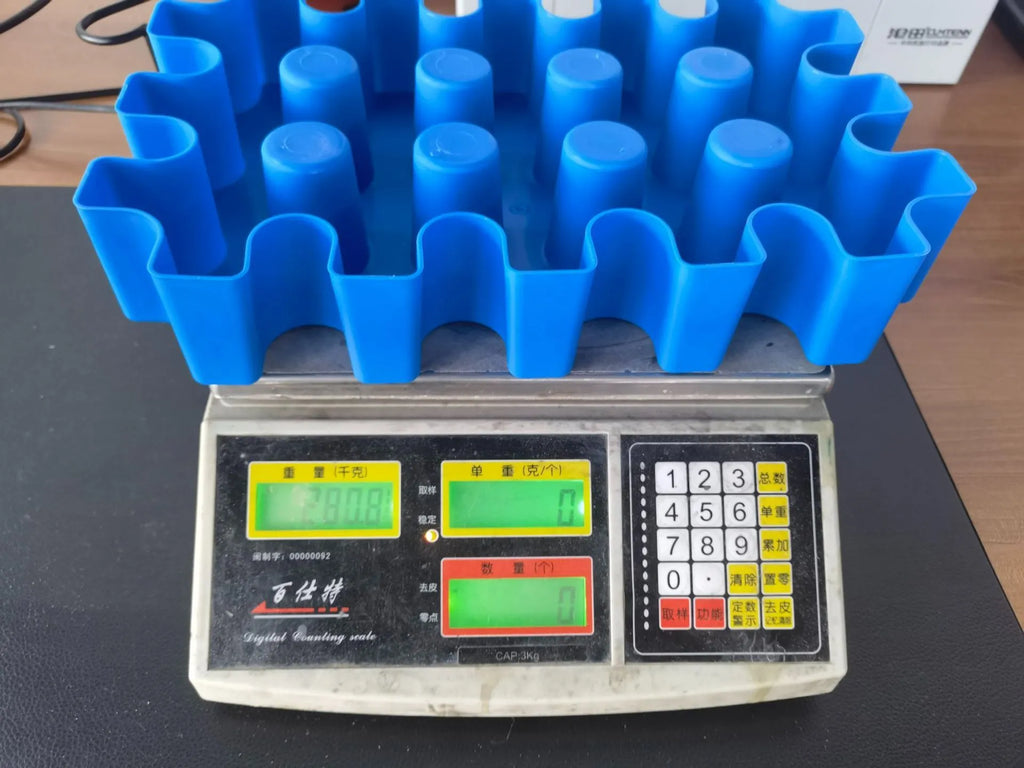 Blue polypropylene ice maker tray measuring 34cm long for outdoor camping and barbecues