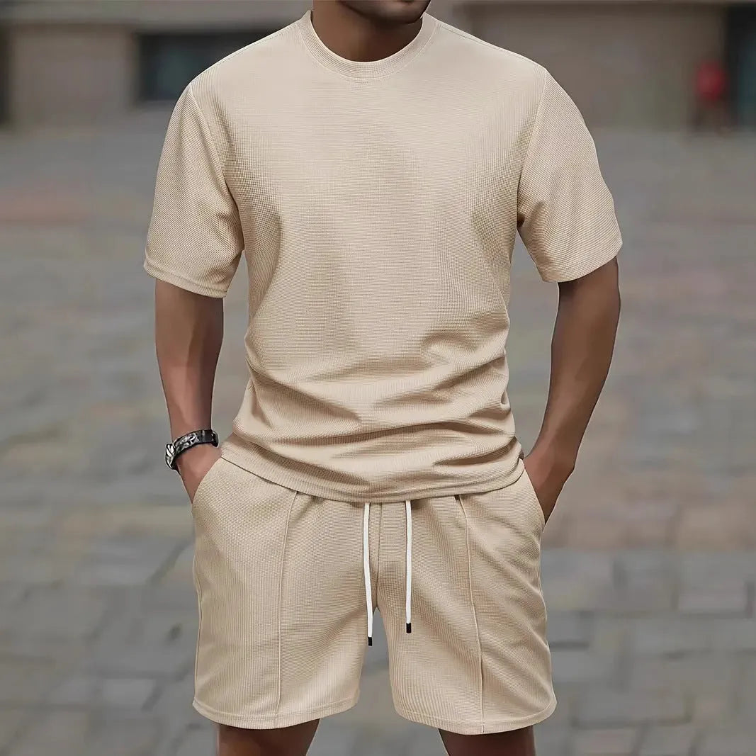 Men's apricot waffle texture short sleeve blouse and matching shorts laid flat.