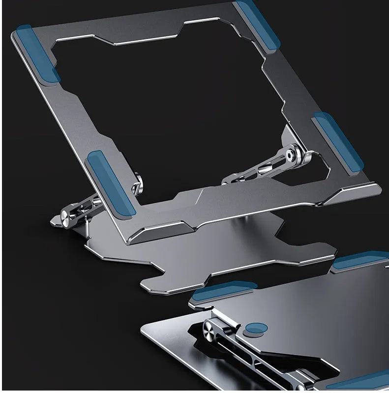 Grey aluminium folding laptop stand shown at an adjustable angle on a wooden desk.