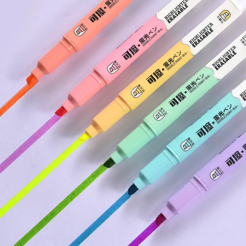 Set of six double-headed fluorescent graffiti marker pens with plastic shells and assorted colours