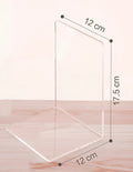 Clear transparent acrylic bookshelf holding a pair of books on a desk.