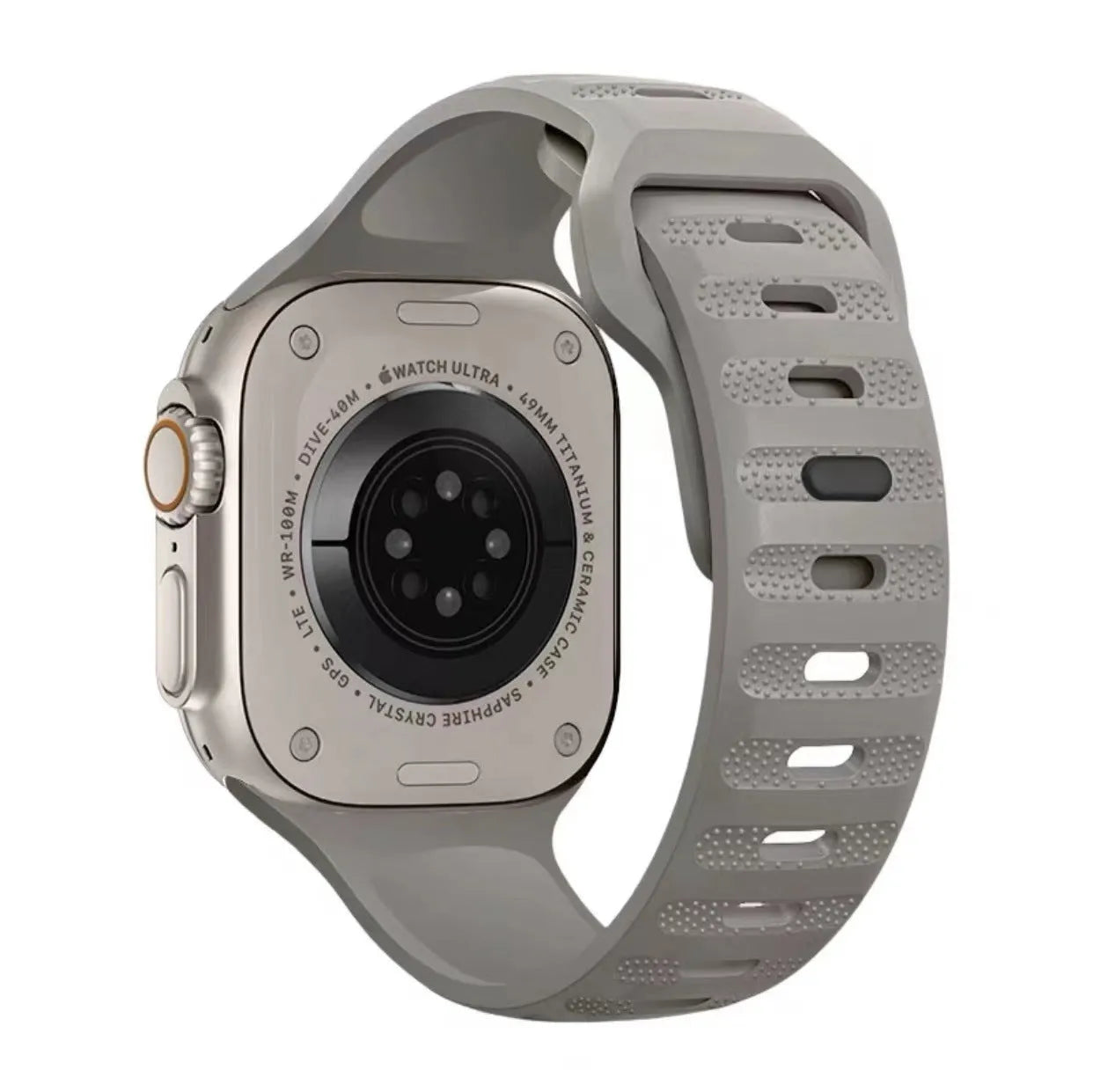 Black fluoro rubber Apple Watch band with T-buckle closure on a wrist, showing compatible Ultra model.