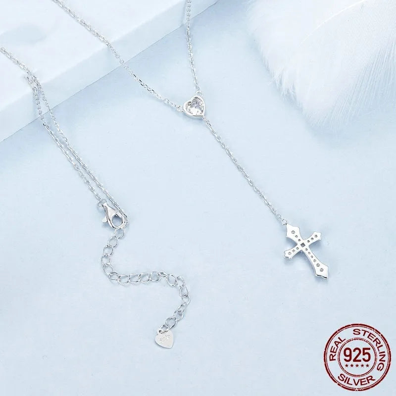 Silver love cross necklace with V-shaped pendant on an O-ring chain, colour BSN384.