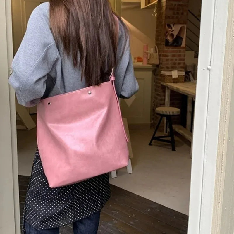 Corduroy one-shoulder commuter bag in pink or brown with PU lining, 39cm length