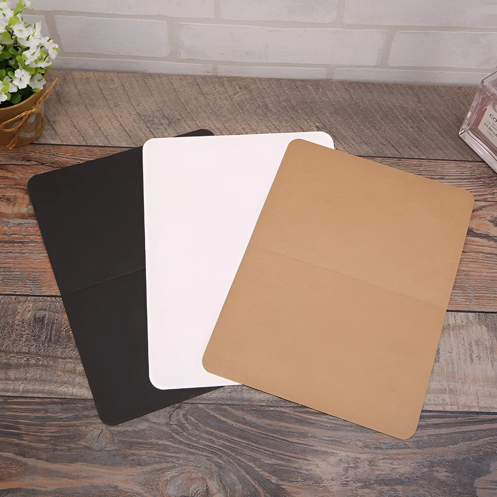 Pack of 100 blank A6 kraft paper folded cards in black, white, and natural brown colours