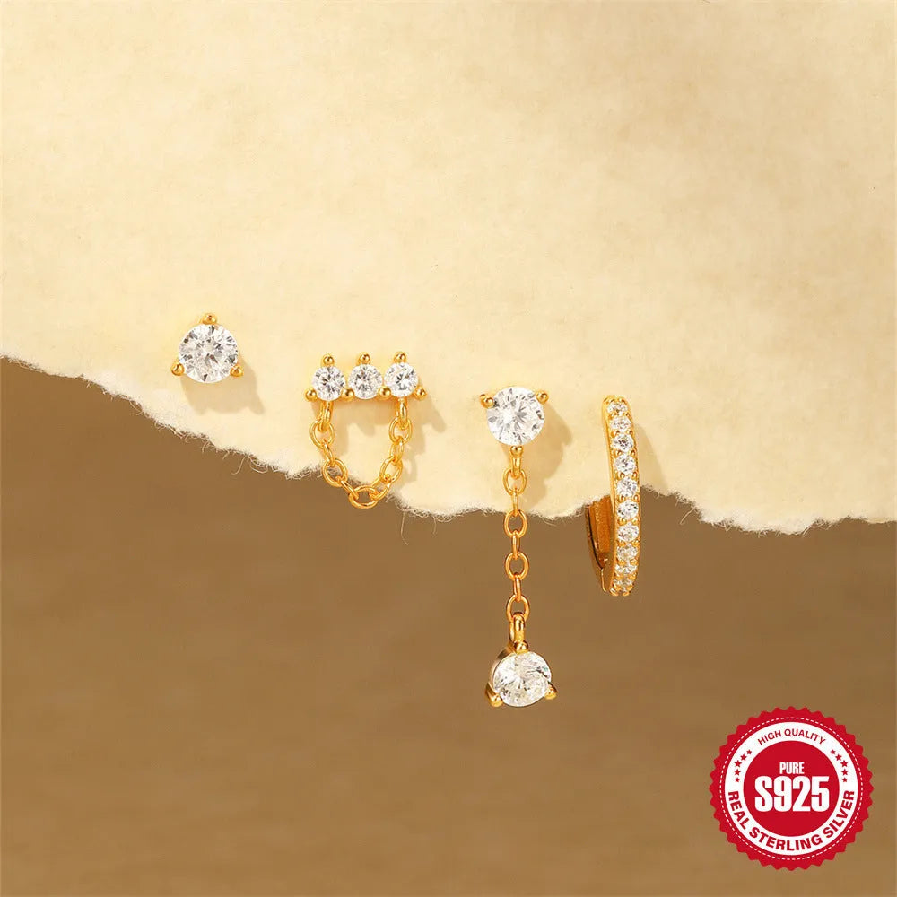 S925 sterling silver clover petal earrings with gold electroplating in a simple geometric design.