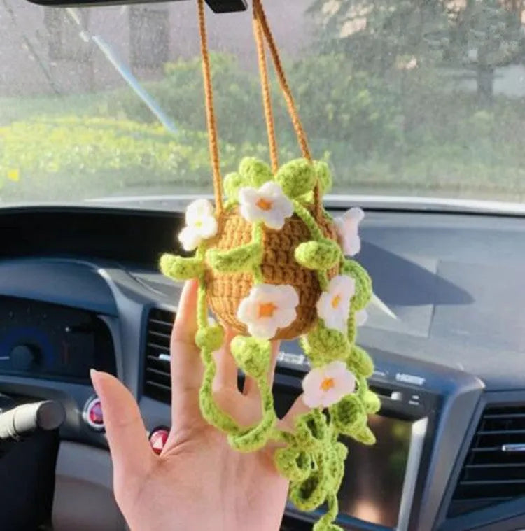 Green and white knitted wool car plant decoration with basin base and hanging rope
