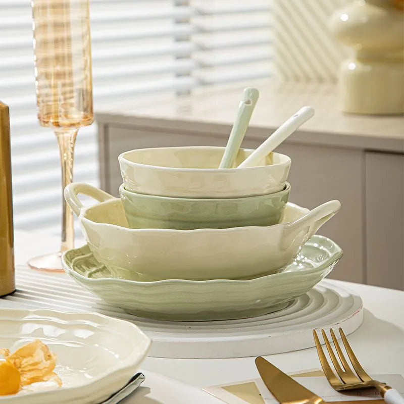Solid colour ceramic dinnerware set with plates and bowls in modern Japanese minimalist style.