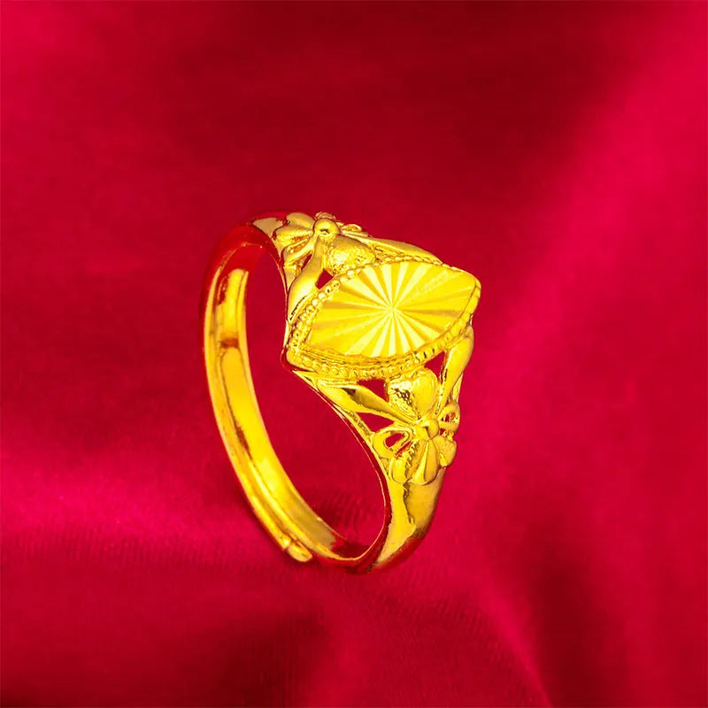 Alluvial gold electroplated brass ring with open diamond flower design and geometric texture