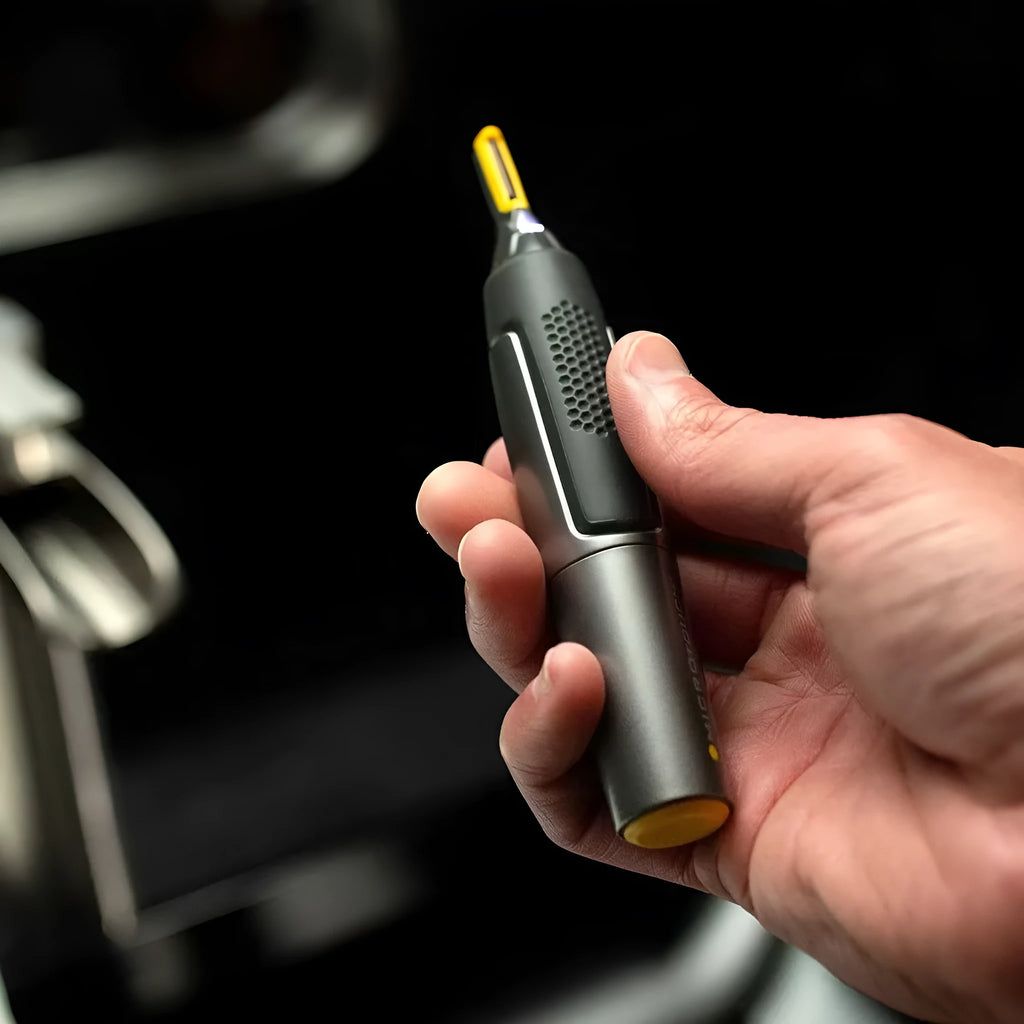Grey ABS electric hair catcher for men with floating cutter head and dry battery power, in colour box