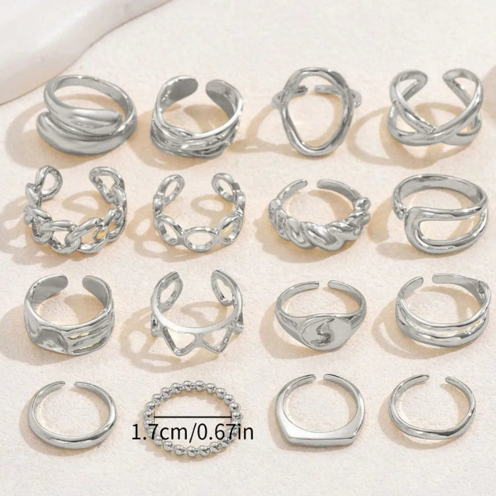Women's 16-piece open ring suit in silver and gold zinc alloy geometric shape on display