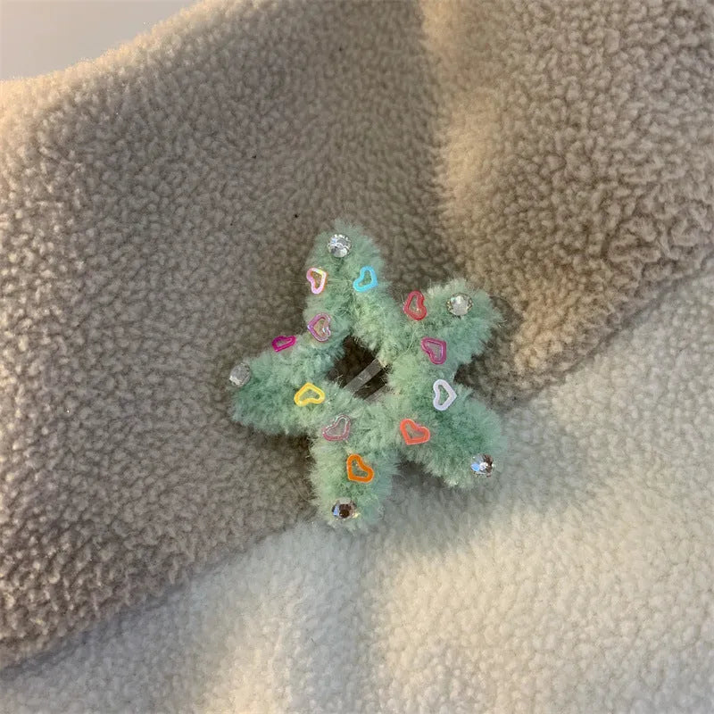 Plush hair clip with diamond star edge in pink, showing manual finish and side clip design
