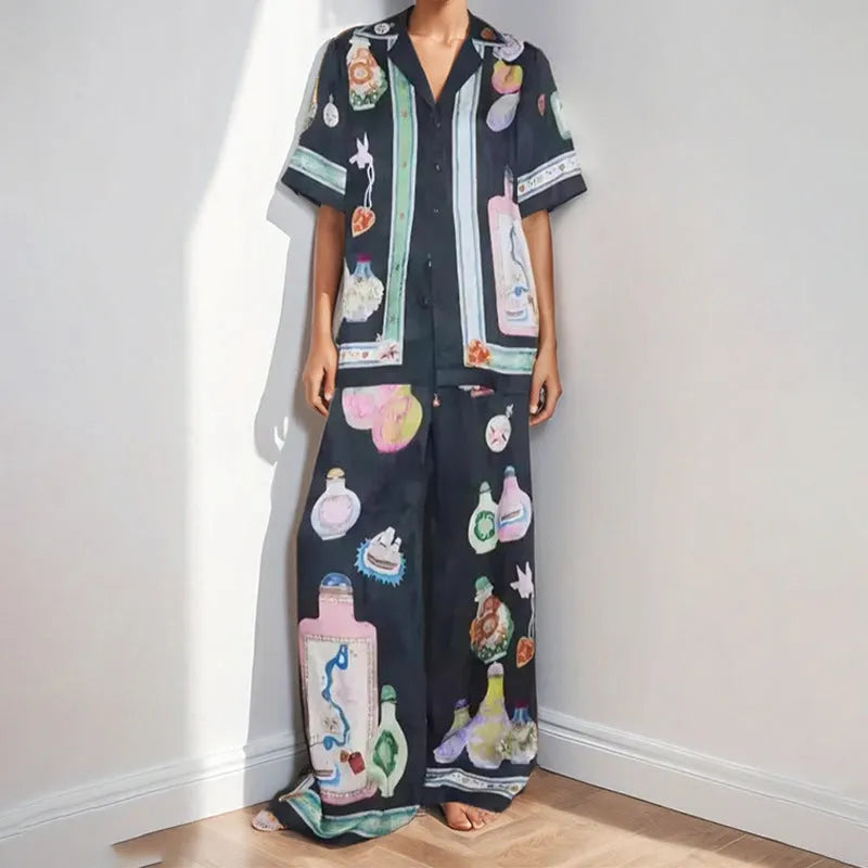 Black women's cardigan and trousers set with cartoon animation print