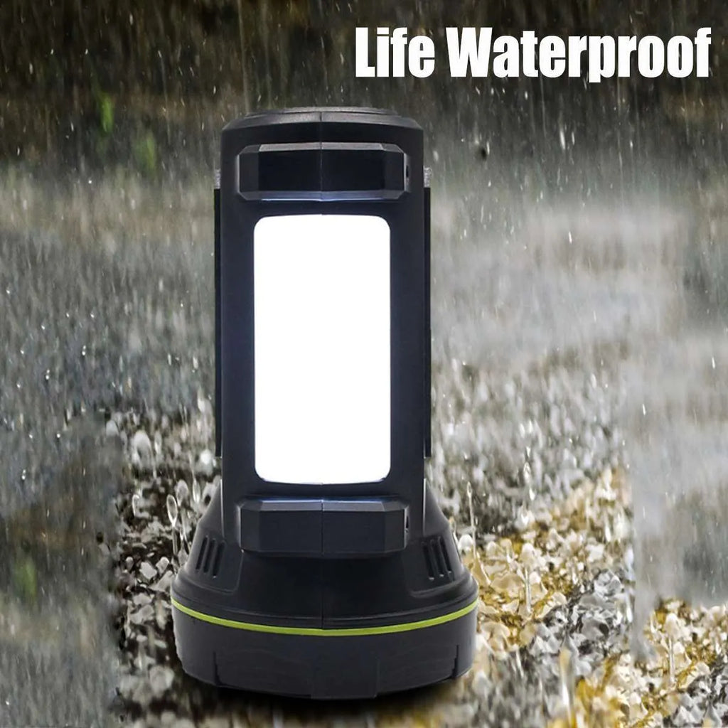 Green rechargeable LED flashlight with USB port on a dark background.