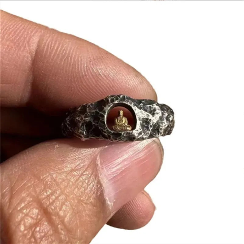 Hand-forged copper grotto Buddha ring with a rock texture surface, shown in size 8.