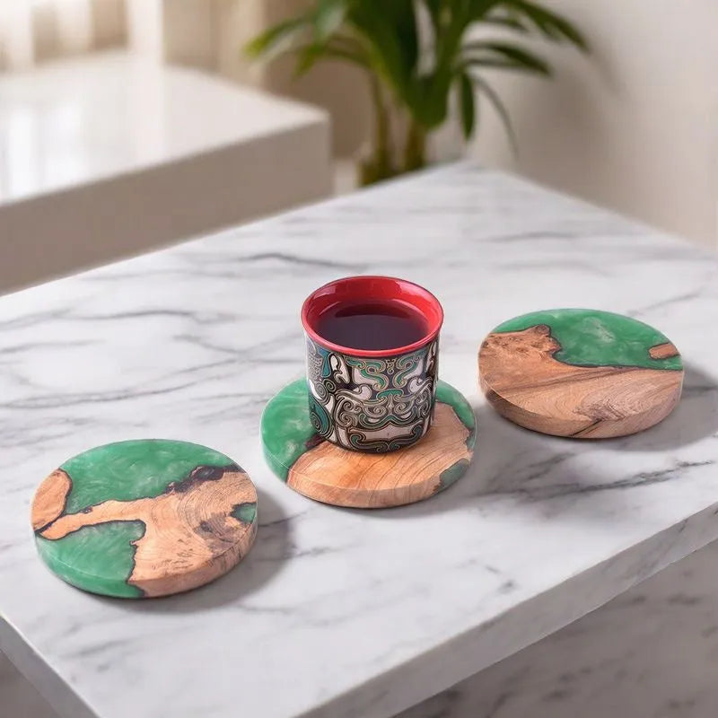A solid wood resin coaster in a Nordic style, showing a round tumour green pattern on a 9.8cm wide, 1cm thick base.