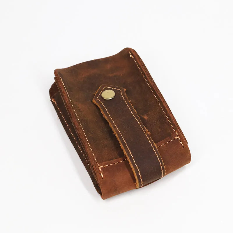 Crazy horse leather key case 7cm by 11.5cm in dark brown colour lying flat