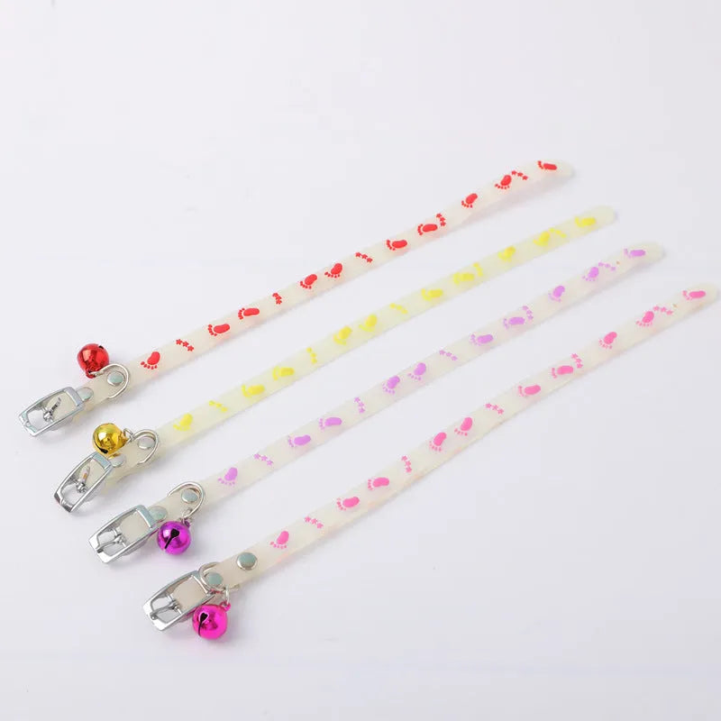 Luminous cat collar with adjustable silicone strap and metal bell in one of four patterns