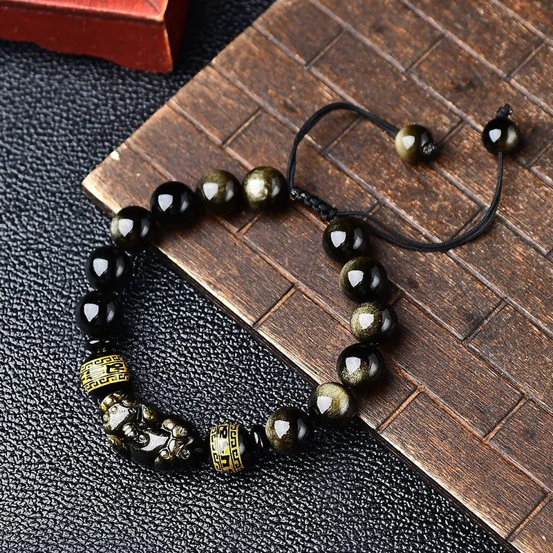 Hand-woven golden obsidian Pi Xiu bracelet with zodiac design in multiple bead sizes