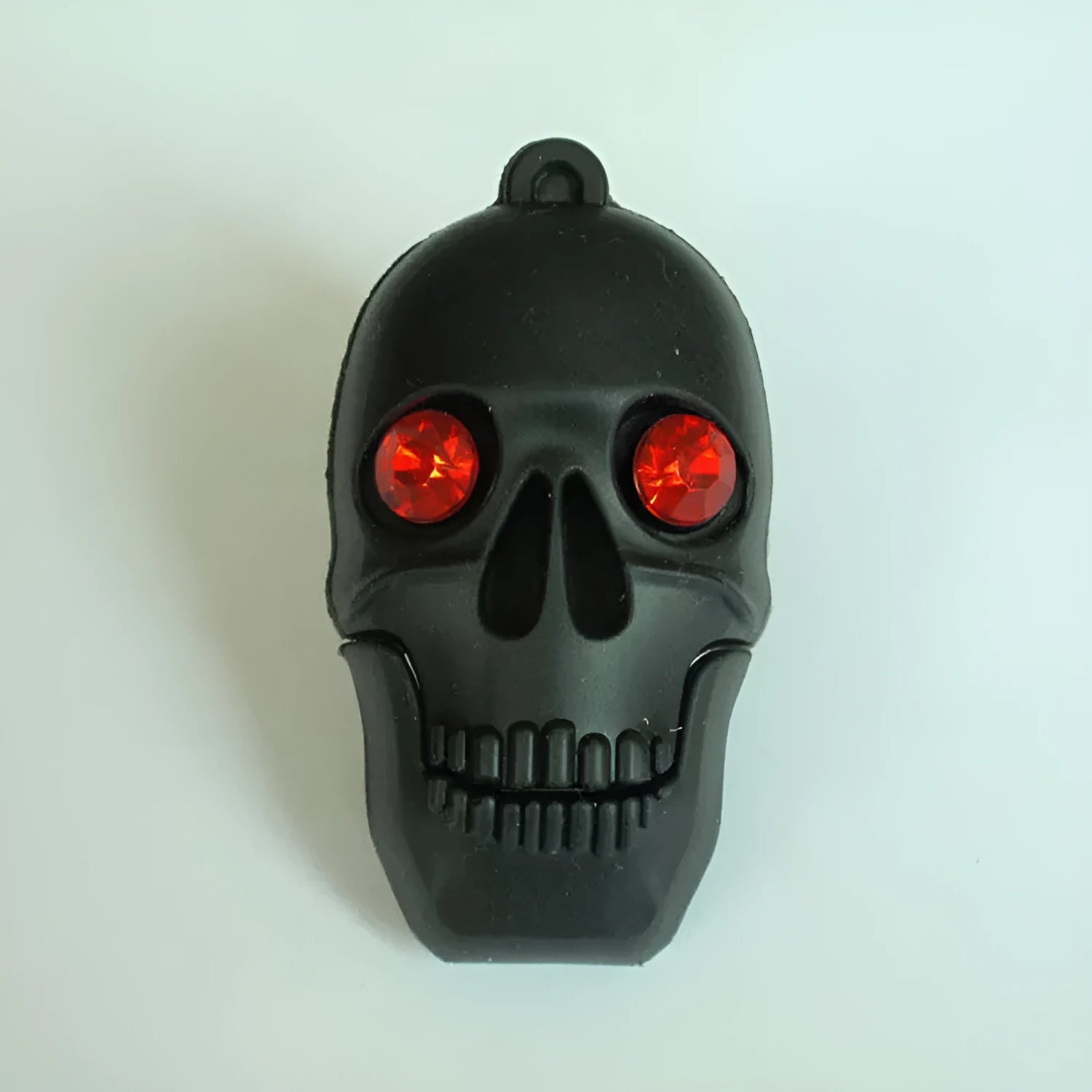 Halloween skeleton skull shaped USB flash drive with cartoon features and attached keychain