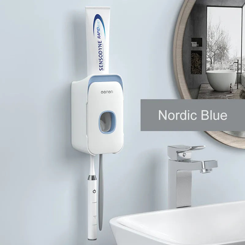 Automatic toothpaste dispenser in blue colour mounted on a bathroom wall
