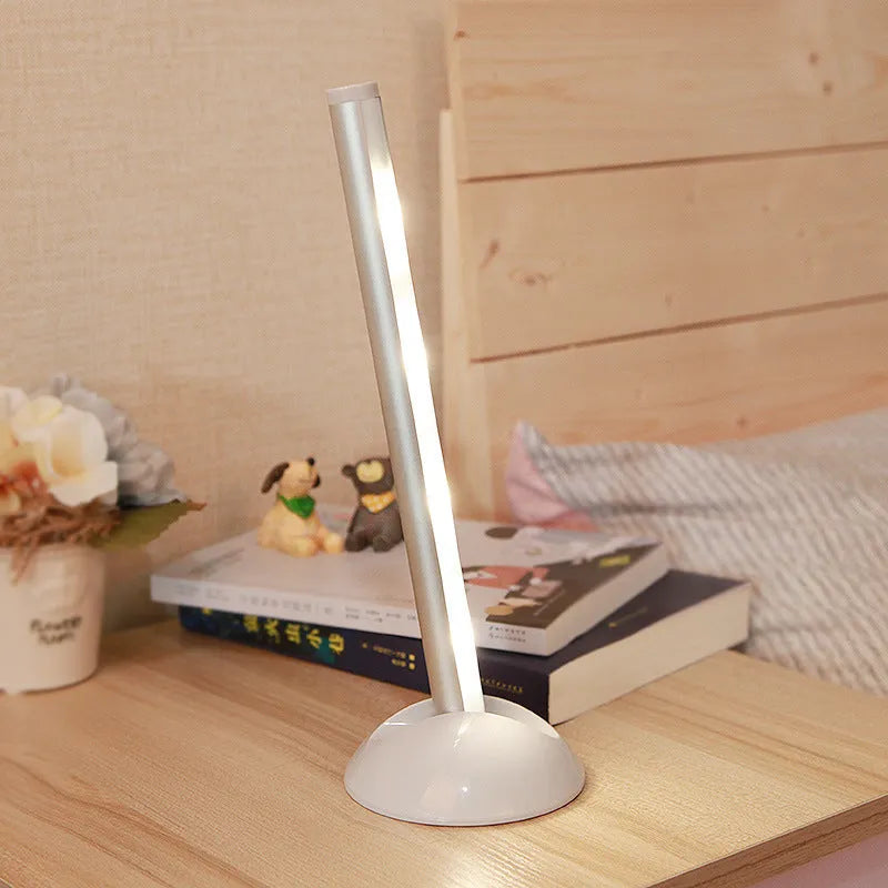 40 cm long remote control LED mirror lamp with aluminium body and frosted plastic diffuser.