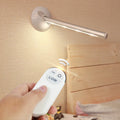 40 cm long remote control LED mirror lamp with aluminium body and frosted plastic diffuser.