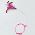Adjustable cat collar toy with feather and bell attachments on steel wire teaser